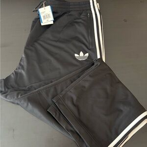 Adidas Black Track pants with Signature Stripes